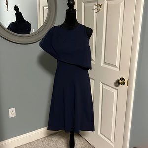 Woman’s, size XS, navy blue dress made by Vera Fishbaugh. NWT.